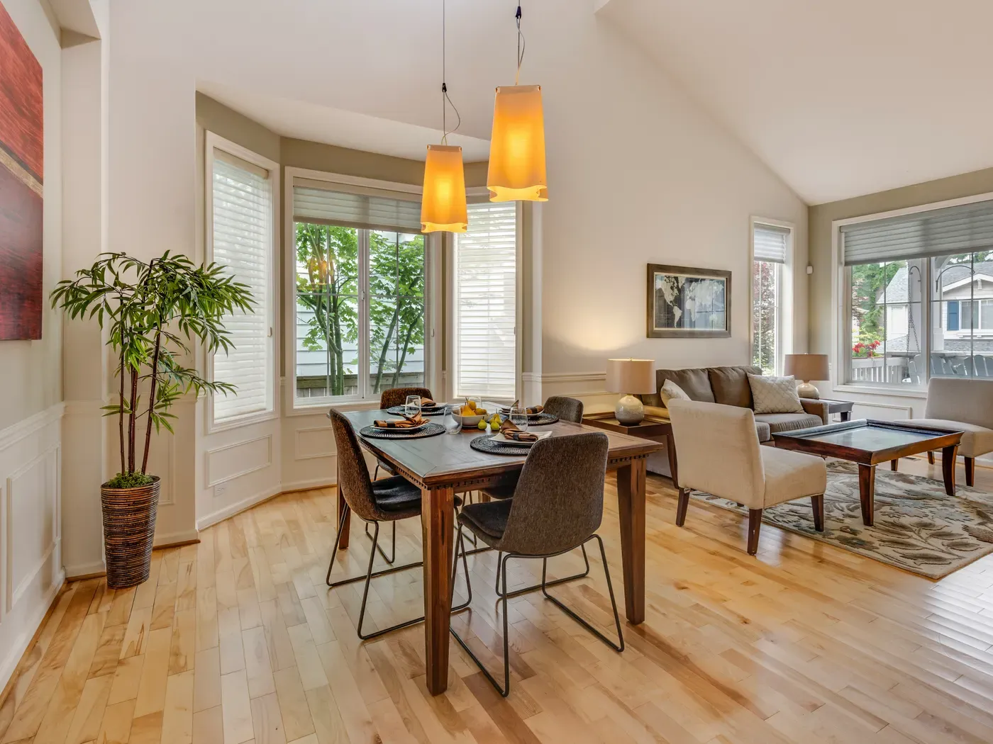 A bright, tidy living and dining room in a Richmond, VA home